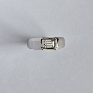 Elegant Silver Ring with Emerald Cut Moissanite